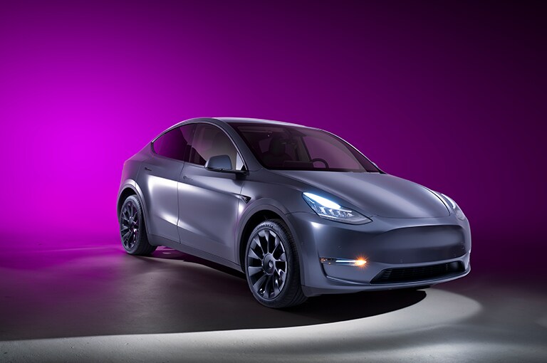 3M Paint Protection Film on Matte Tesla SUV with Purple Wrap