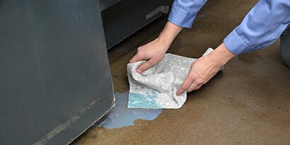 cleaning up a spill in a facility