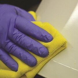 Clean damaged area of bumper