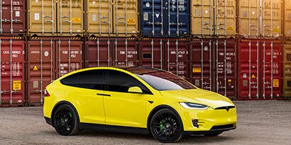 Car with Vinyl Gloss Lucid Yellow 3M™ Wrap Film.
