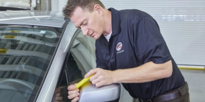 3M Certified Installers applying PPF to a car
