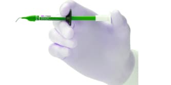 hand holding syringe
