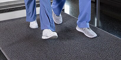 feet walking on mat