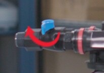 Opening the inlet valve of a 3M™ High Flow Series Multi-Equipment Filtration System Model DP290.
